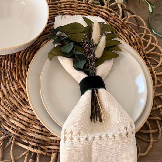 Handcrafted mini bouquet with eucalyptus, willow, and grains in neutral tones, perfect for fall decor in a small vase or tabletop display.