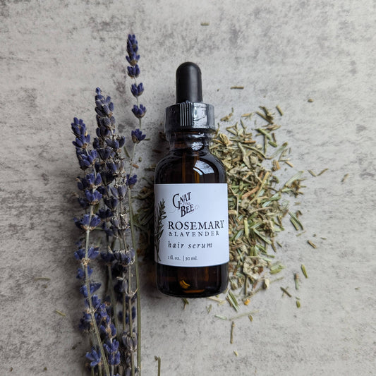 Rosemary and Lavender Hair Serum in a 1 oz glass dropper bottle, made with natural oils and essential oils to promote hair growth, nourishment, and shine.