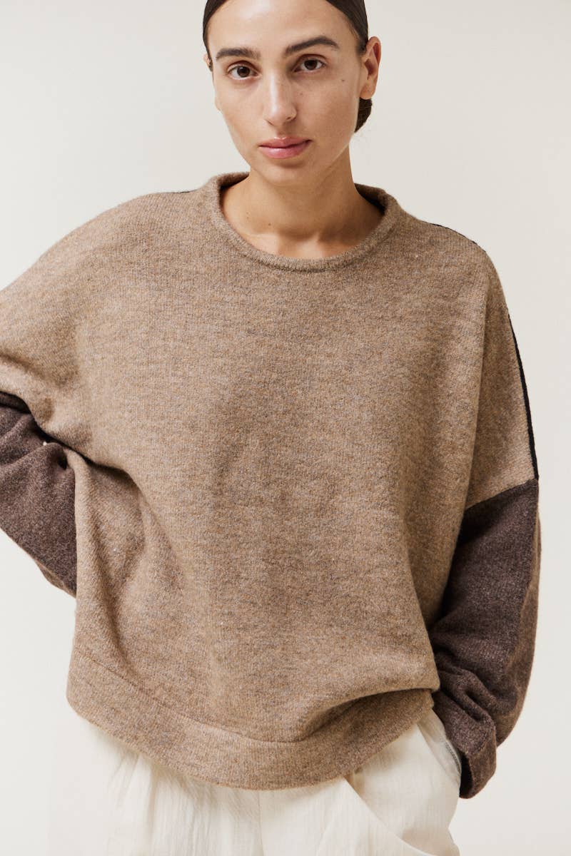 Oversized Color Block Pullover with soft, cozy fabric in contrasting color blocks. Front view. 