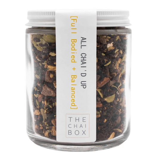 The Chai Box All Chai'd Up Masala Loose Leaf Tea in a 4oz glass jar, featuring a blend of traditional masala chai spices like ginger, cinnamon, and cardamom.