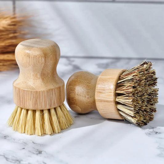 Bamboo dish scrub brush with natural sisal and coconut bristles, designed for eco-friendly, sustainable cleaning. Compostable and plastic-free.