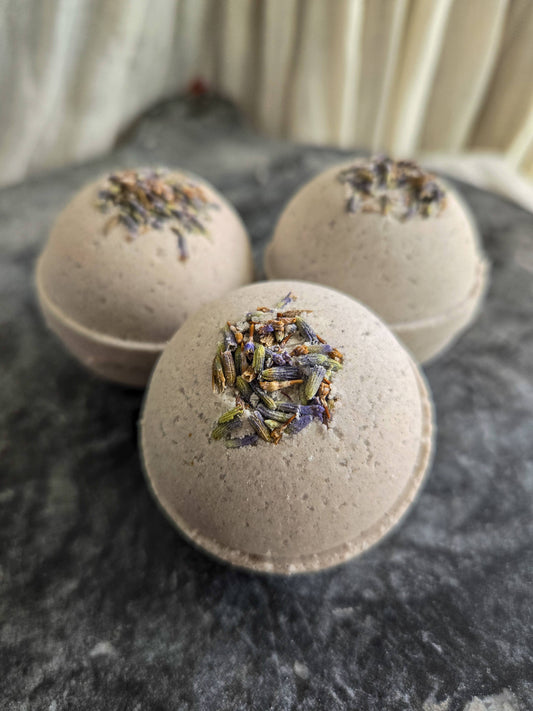 Sweet Lavender Bath Bomb with calming lavender and vanilla scent, ideal for bedtime relaxation and skin nourishment during bath rituals.